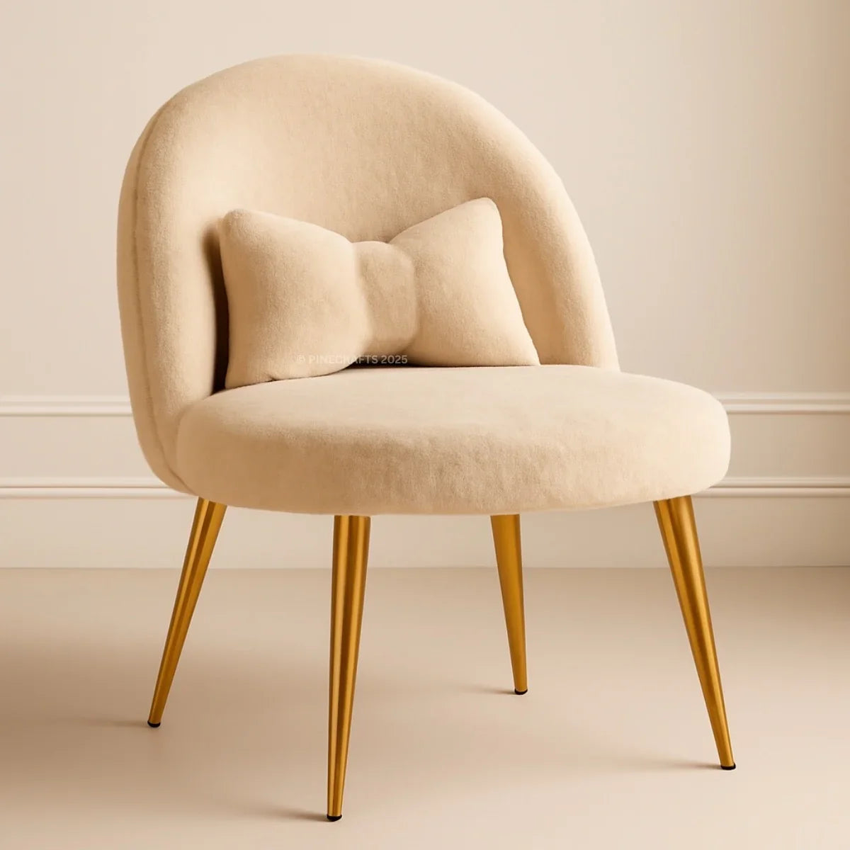 Beige armchair with gold legs and cushions on a beige background